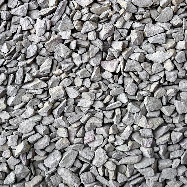 driveway gravel is a cost-effective and low-maintenance option that provides good drainage and a natural aesthetic